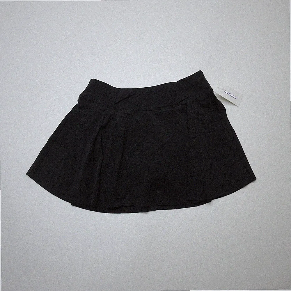 Ovruns Damen Sport Tennis Skort Größe L schwarz Plissee Laufen Golf Neu mit Etikett